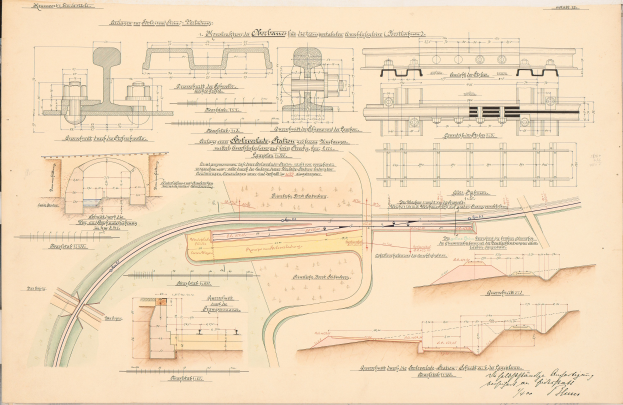 Altes Buch mit detaillierten Zeichnungen und Text eines Eisenbahnlayouts, einschließlich einer Illustration der Zuggleise.